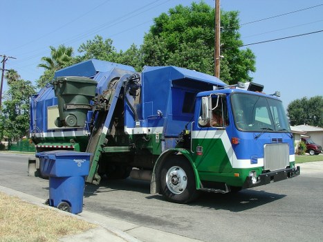 Business professionals discussing waste removal plans